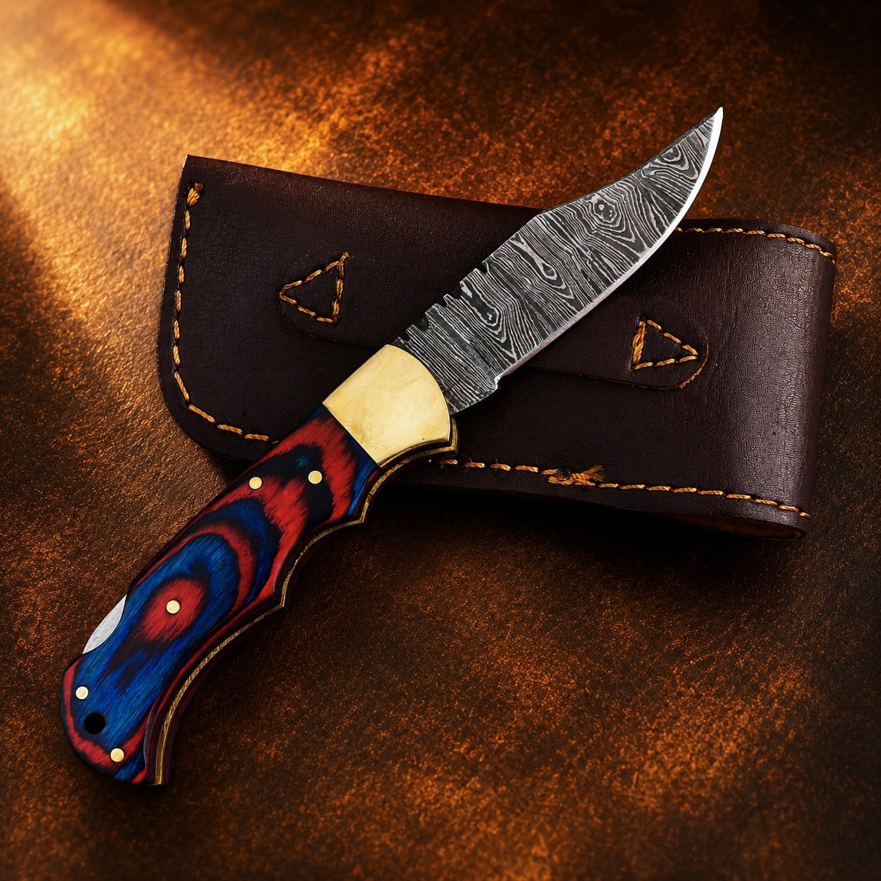 Heritage Damascus Folding Knife – Hand Forged Steel with Pukka Wood Handle, Brass Bolster & Leather Sheath