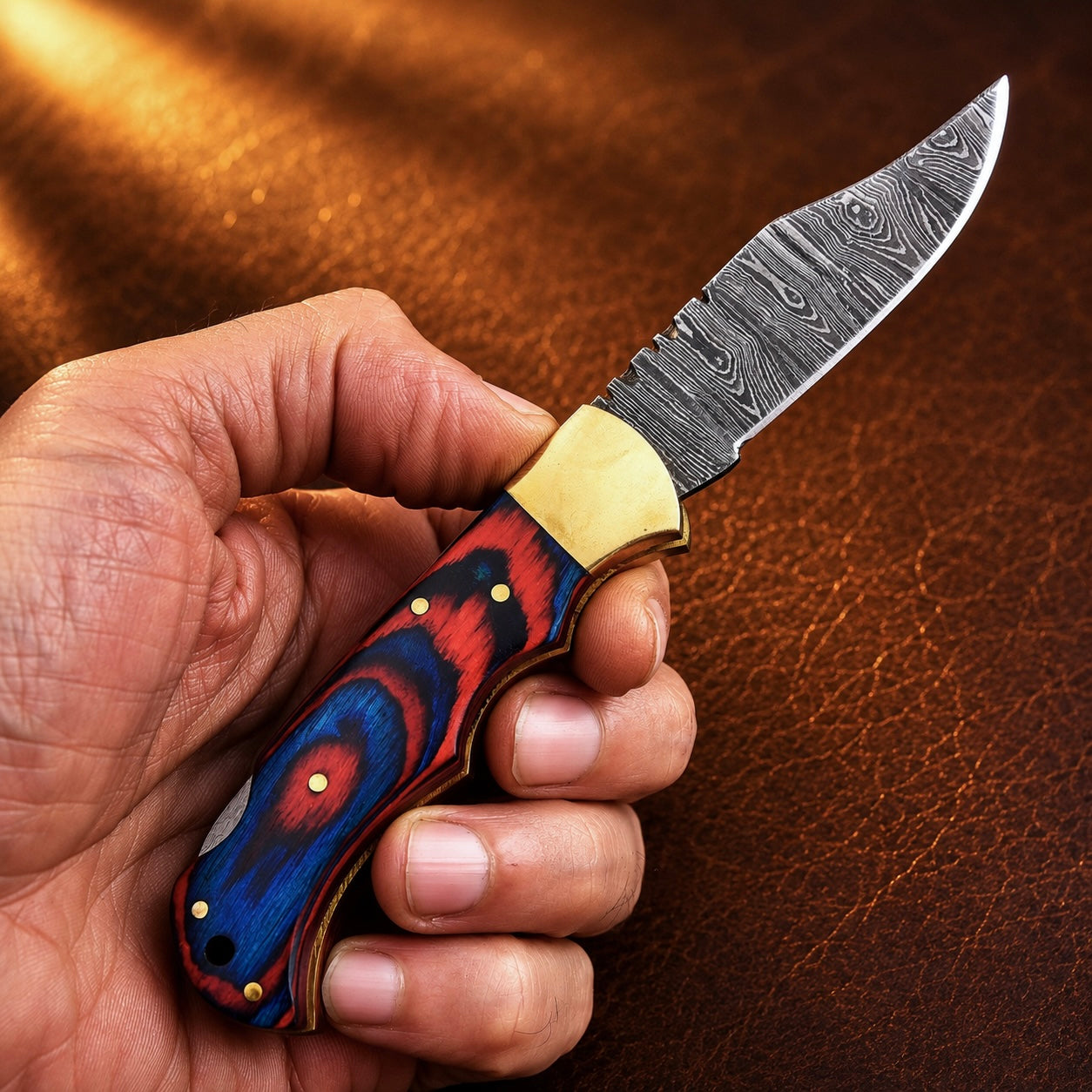 Heritage Damascus Folding Knife – Hand Forged Steel with Pukka Wood Handle, Brass Bolster & Leather Sheath