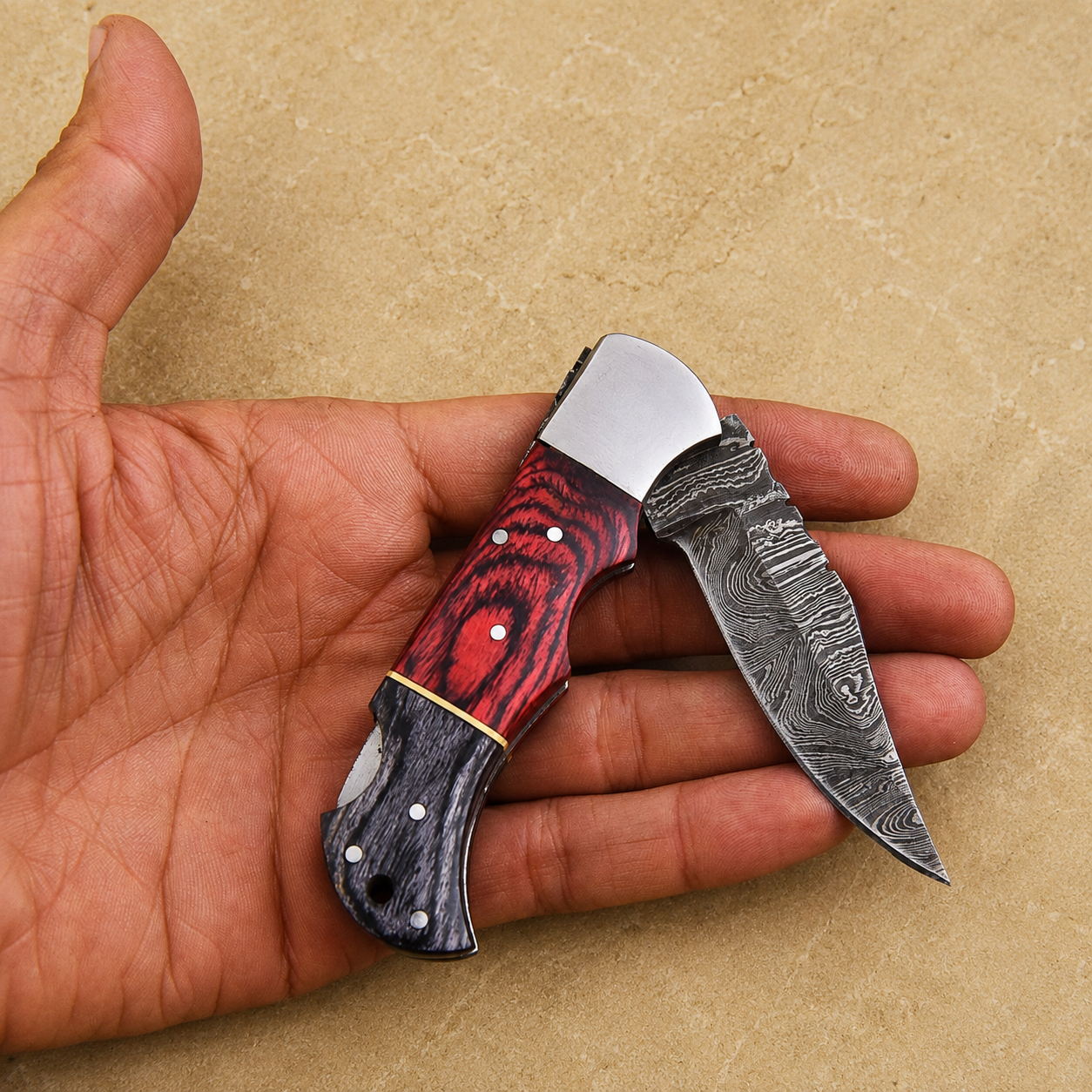 Crimson Edge Damascus Steel Folding Knife – Red & Black Pukka Wood Handle, Steel Bolster & Classic Back Lock Custom Engraving Available