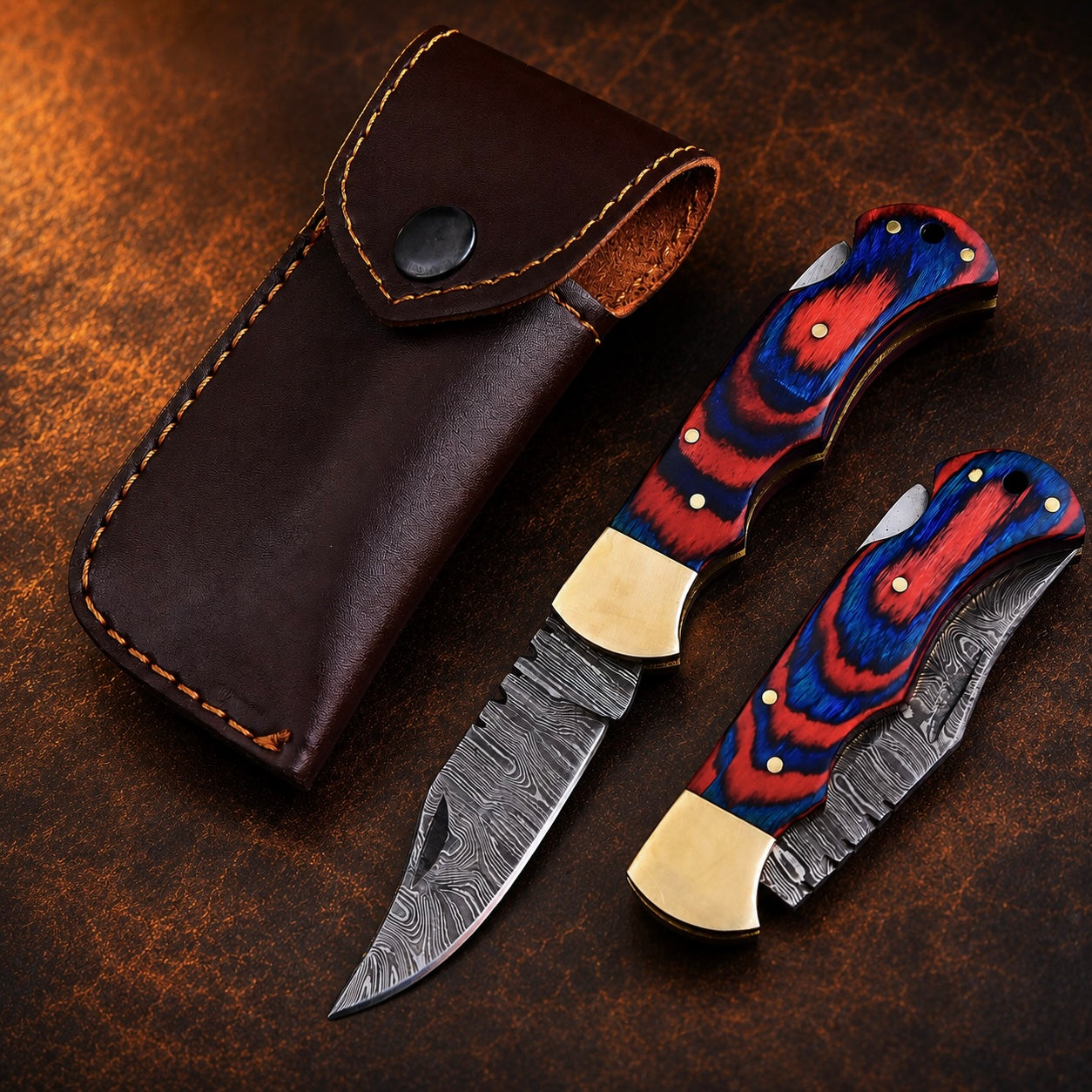 Heritage Damascus Folding Knife – Hand Forged Steel with Pukka Wood Handle, Brass Bolster & Leather Sheath