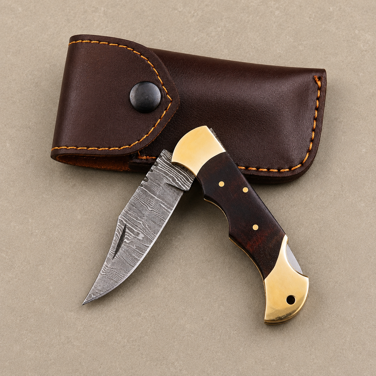 Midnight Timber Damascus Folding Knife – Ladder Pattern Steel with Rosewood Handle, Brass Bolster & Leather Sheath