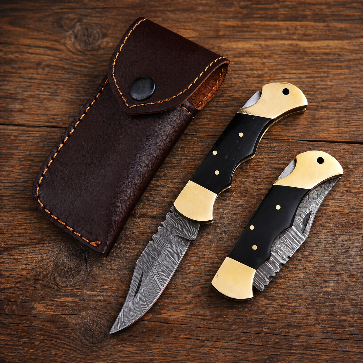 Heritage Damascus Folding Knife – Black Bull Horn Handle, Brass Bolster & Leather Sheath