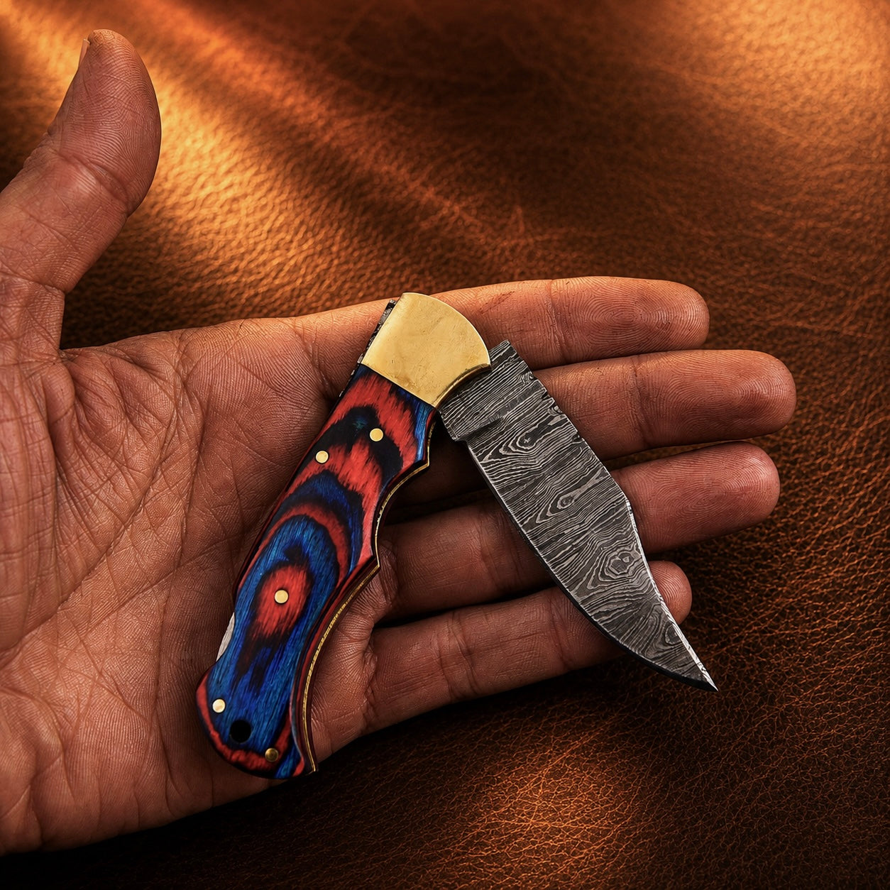 Heritage Damascus Folding Knife – Hand Forged Steel with Pukka Wood Handle, Brass Bolster & Leather Sheath