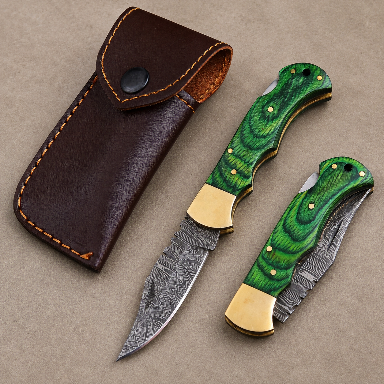 Emerald Ridge Damascus Folding Knife – Hand Forged Steel with Green Pakka Wood Handle, Brass Bolster & Leather Sheath