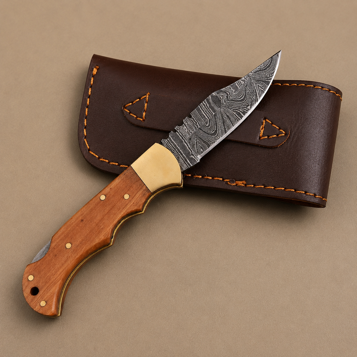 Olive Crest Damascus Folding Knife – Hand Forged Steel, Olive Wood Handle & Leather Sheath