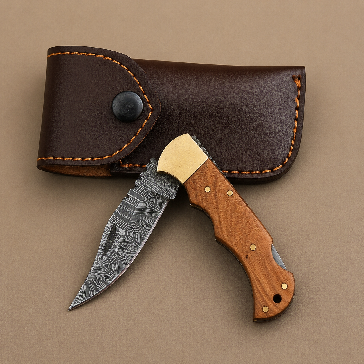 Olive Crest Damascus Folding Knife – Hand Forged Steel, Olive Wood Handle & Leather Sheath