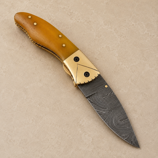 Desert Crown Damascus Folding Knife – 512 Layer Hand Forged Steel with Camel Bone & Brass Handle