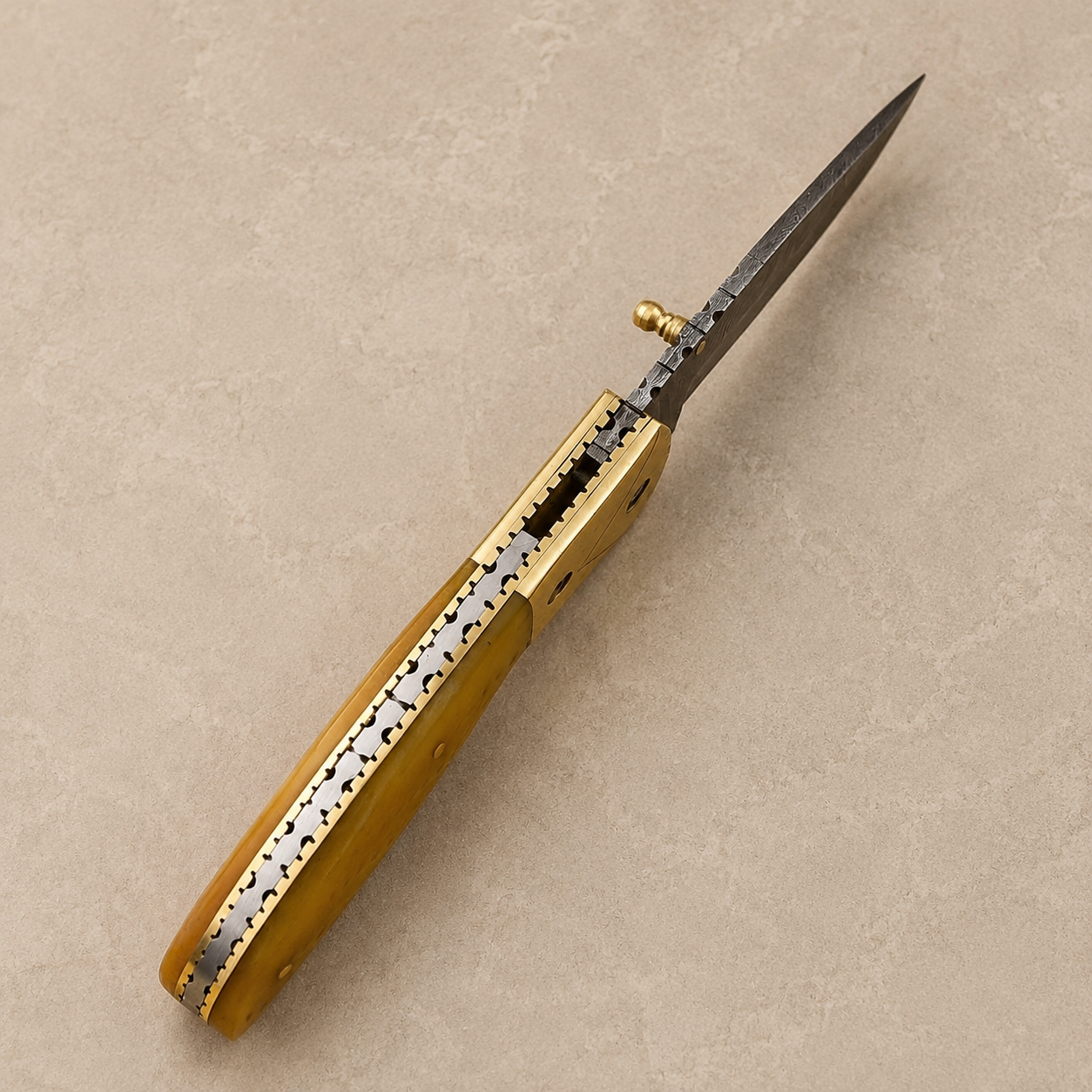 Desert Crown Damascus Folding Knife – 512 Layer Hand Forged Steel with Camel Bone & Brass Handle