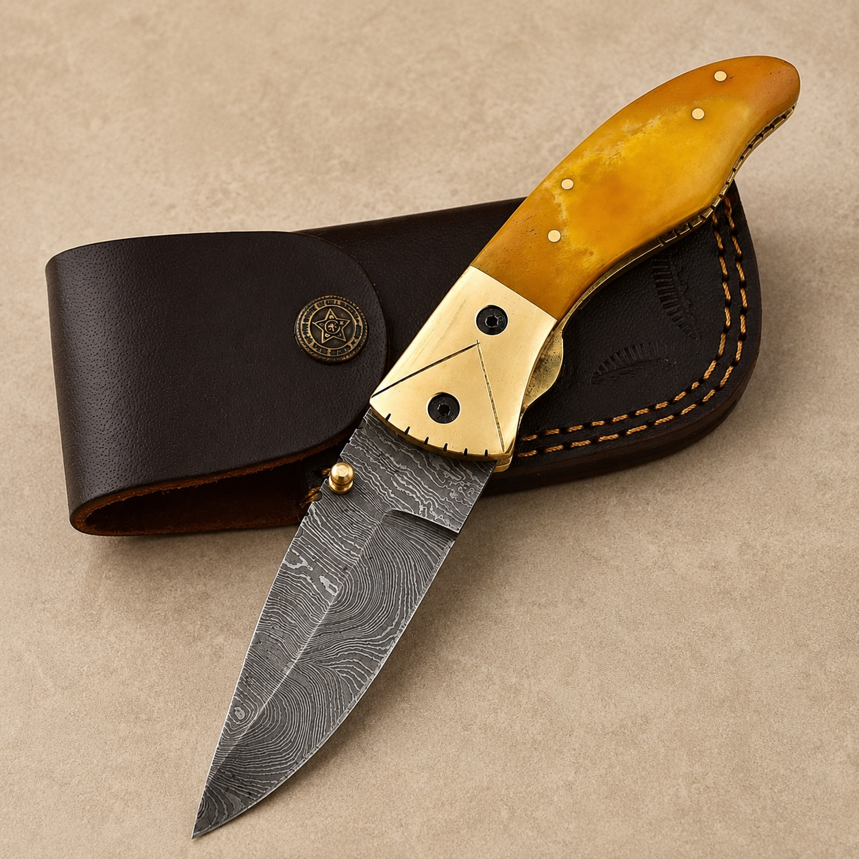 Desert Crown Damascus Folding Knife – 512 Layer Hand Forged Steel with Camel Bone & Brass Handle