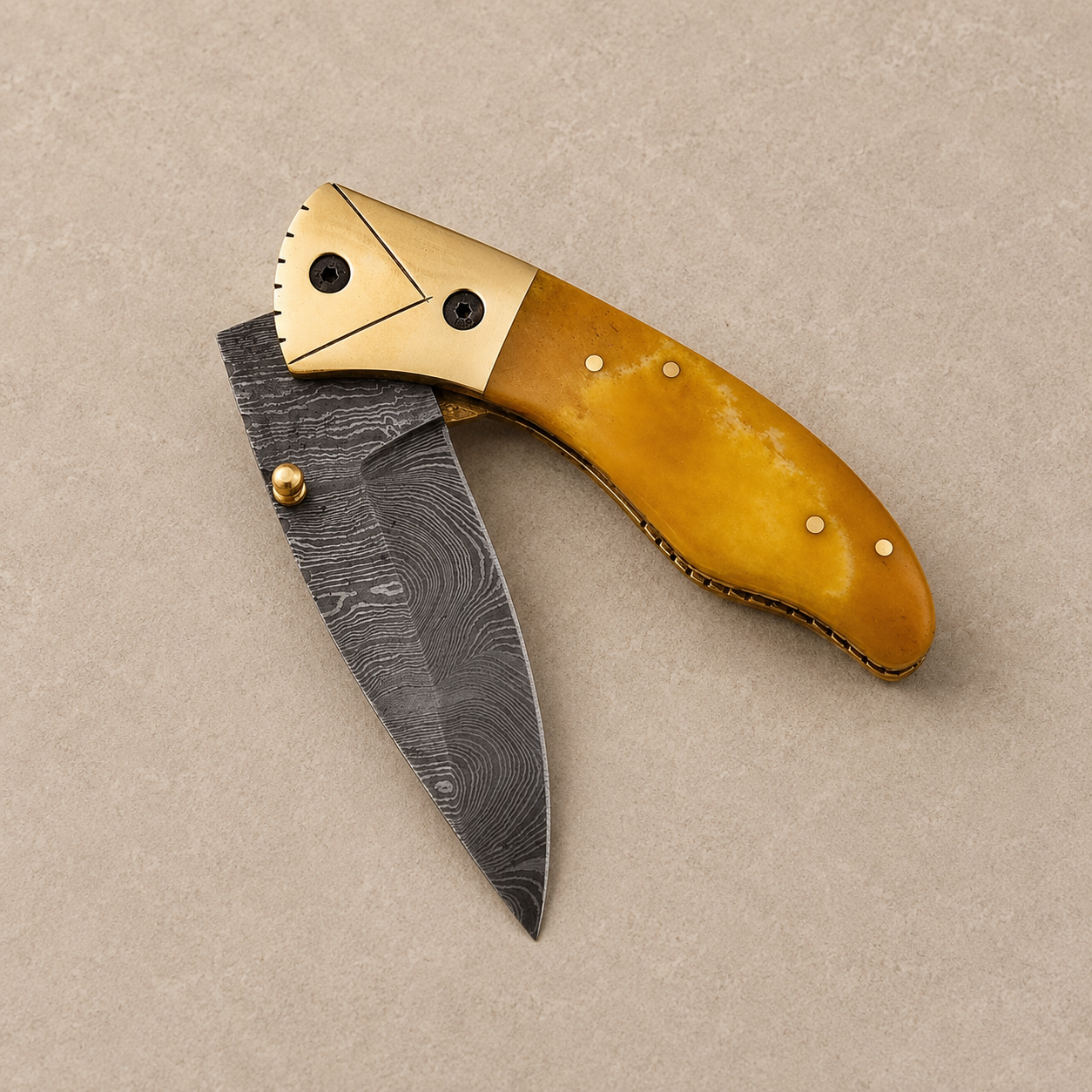 Desert Crown Damascus Folding Knife – 512 Layer Hand Forged Steel with Camel Bone & Brass Handle