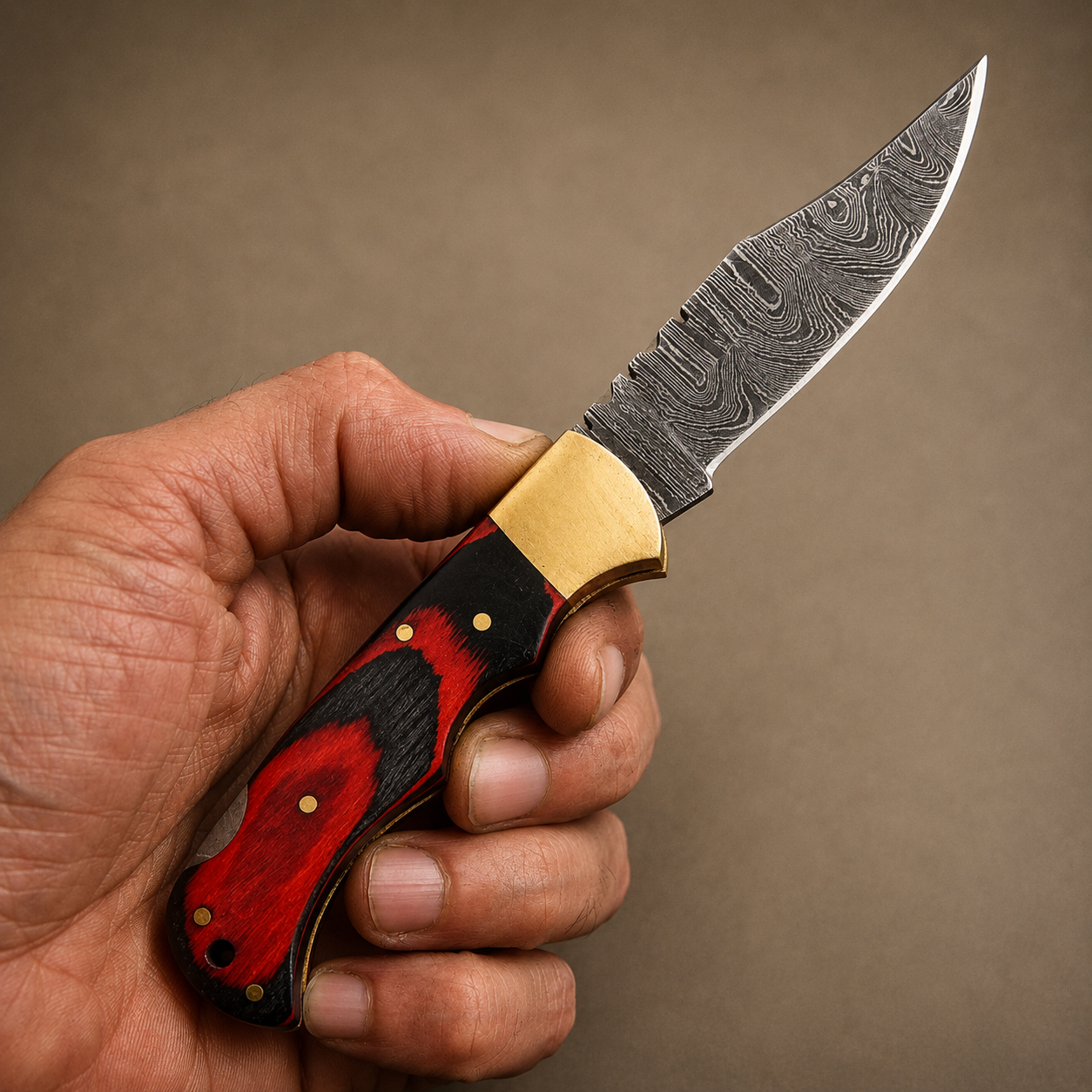 Crimson Oak Damascus Folding Knife – Red & Black Pakka Wood Handle, Brass Bolster & Leather Sheath