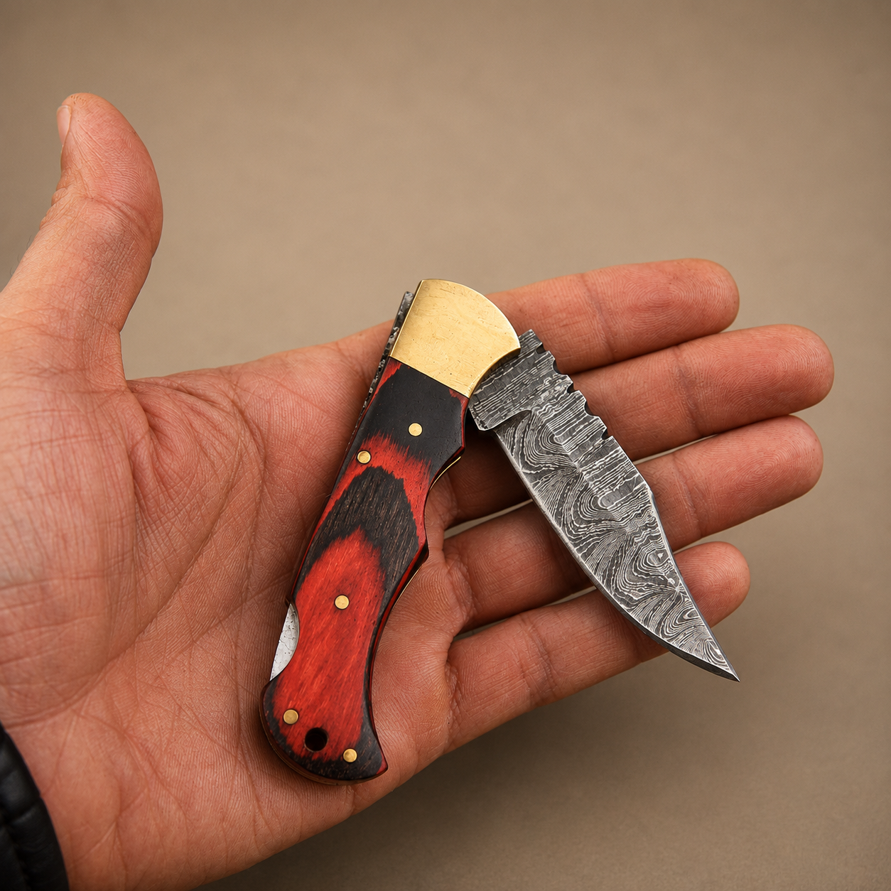 Crimson Oak Damascus Folding Knife – Red & Black Pakka Wood Handle, Brass Bolster & Leather Sheath