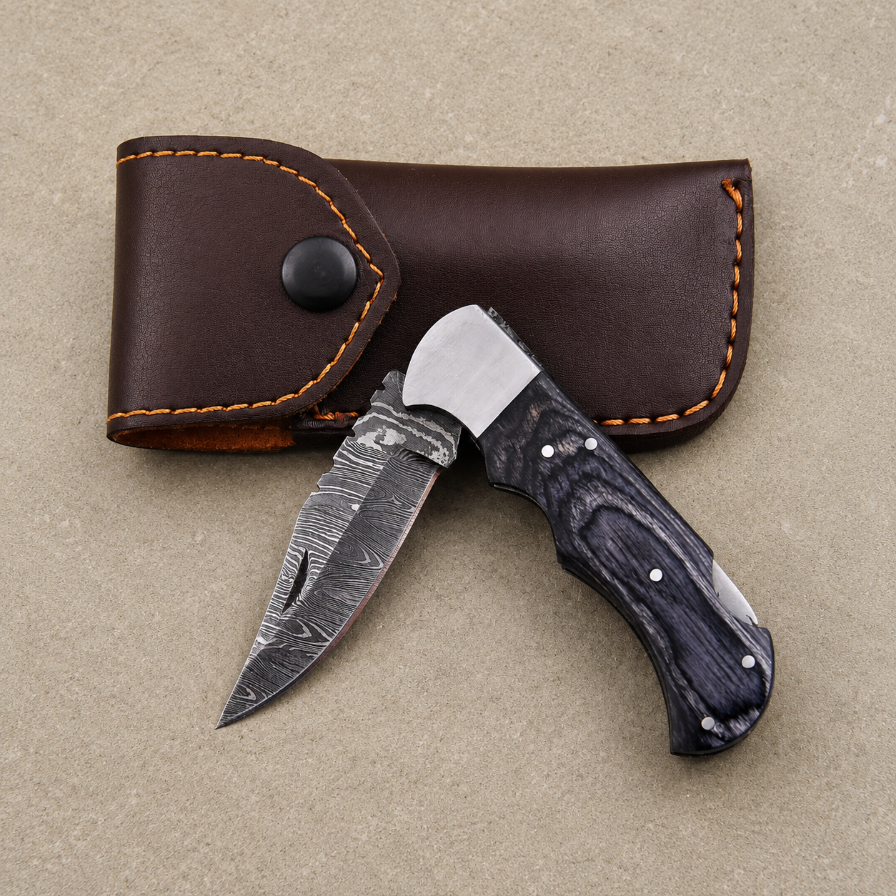 Personalized Damascus Folding Knife – Charcoal Black Pakka Wood Handle, Steel Bolster, Back Lock & Leather Sheath | Custom Engraved Gift