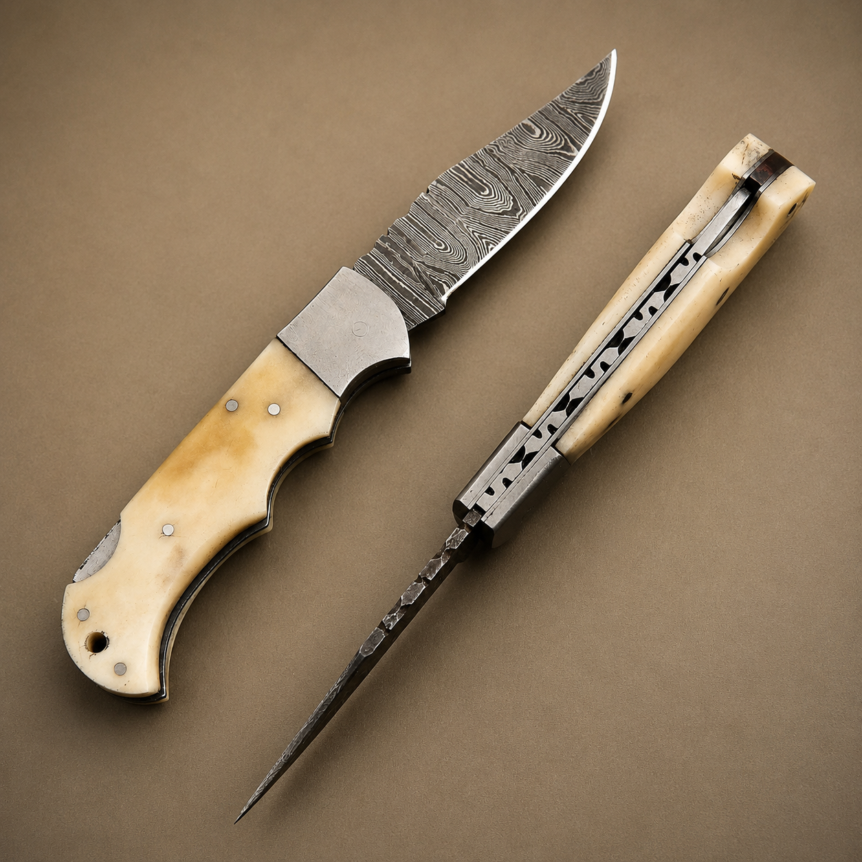 Ivory Peak Damascus Folding Knife – Premium Ivory Horn Handle, Steel Bolster & Leather Sheath