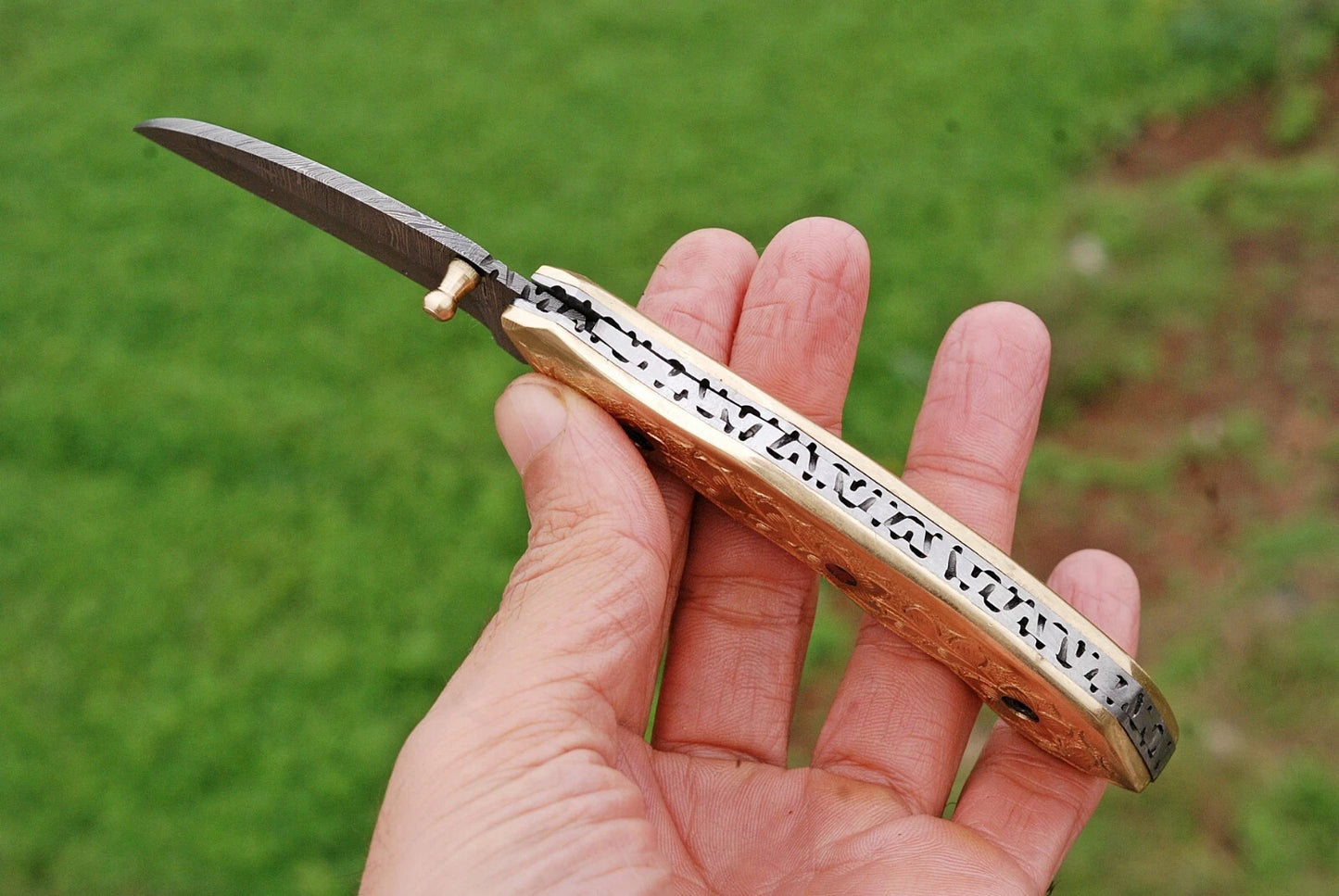 Handmade 512-Layer Damascus Steel Folding Pocket Knife with Engraved Brass Handle & Leather Sheath